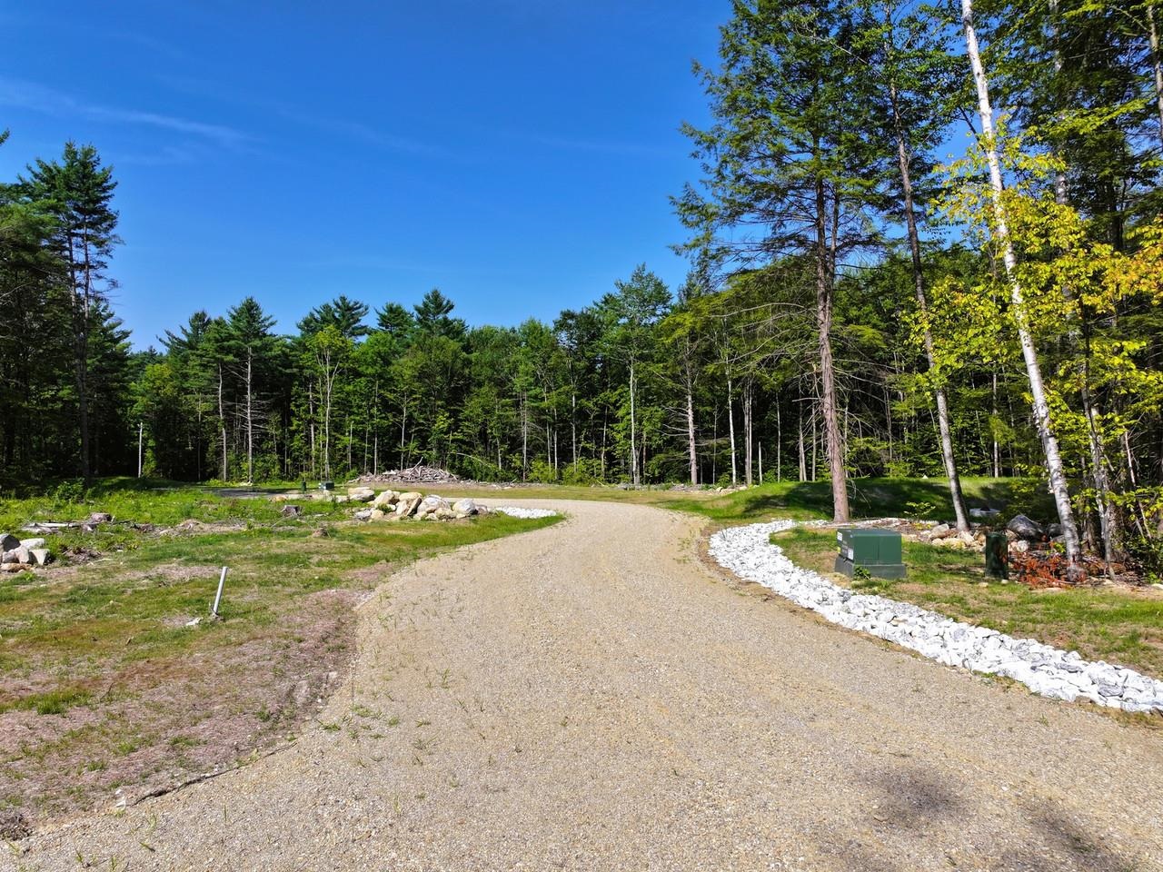 Road leading to Lot 8 on right