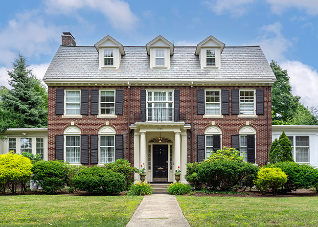 Colonial Brick home with curb appeal