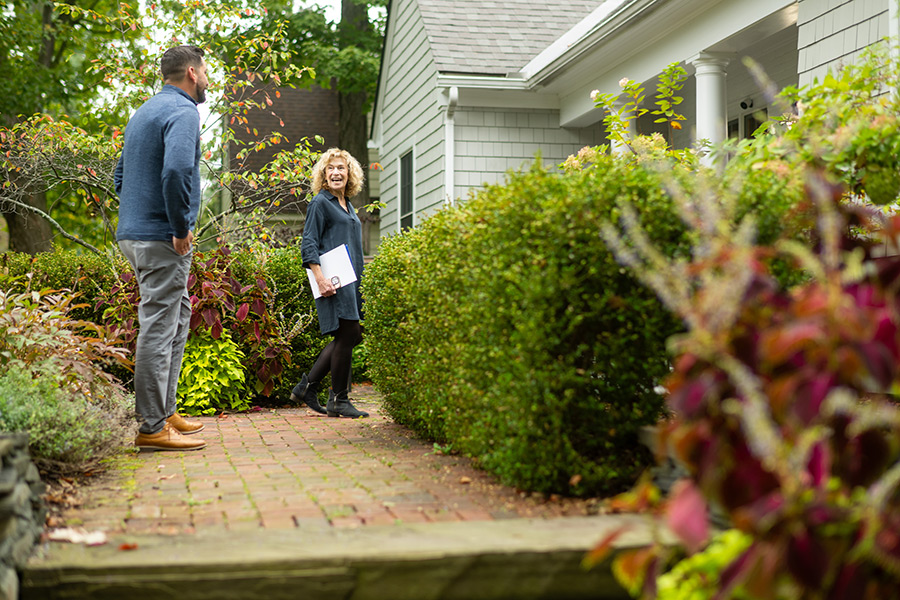 Edie showing a buyer a home